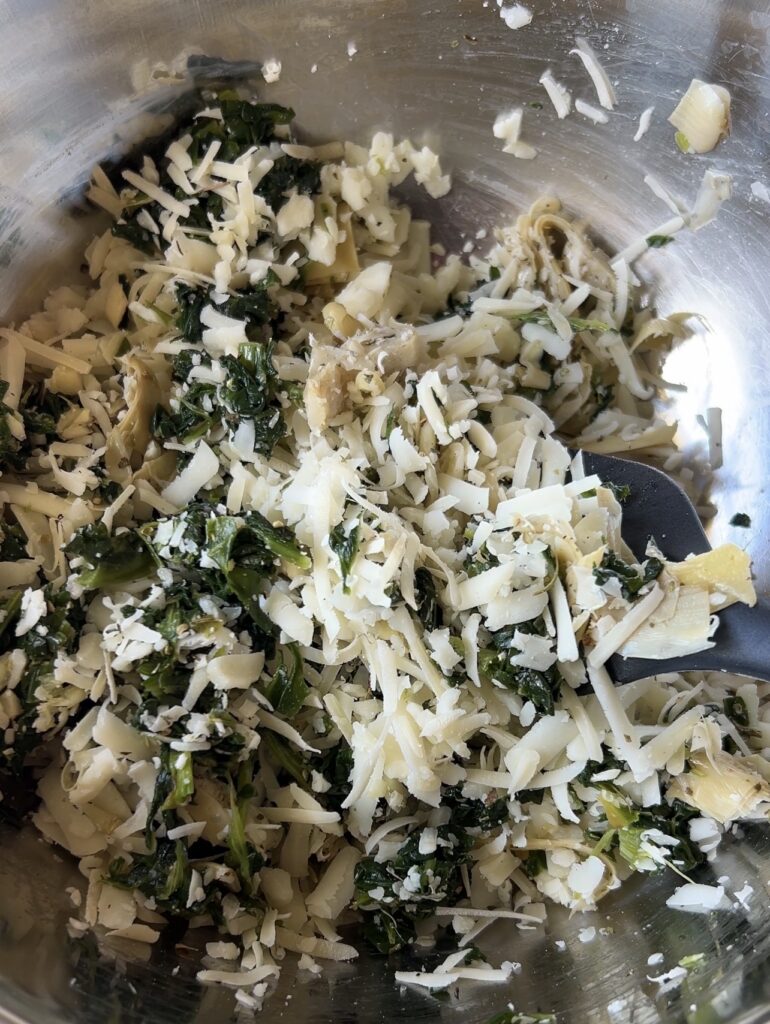 Creamy spinach artichoke filling mixed with mozzarella and Parmesan