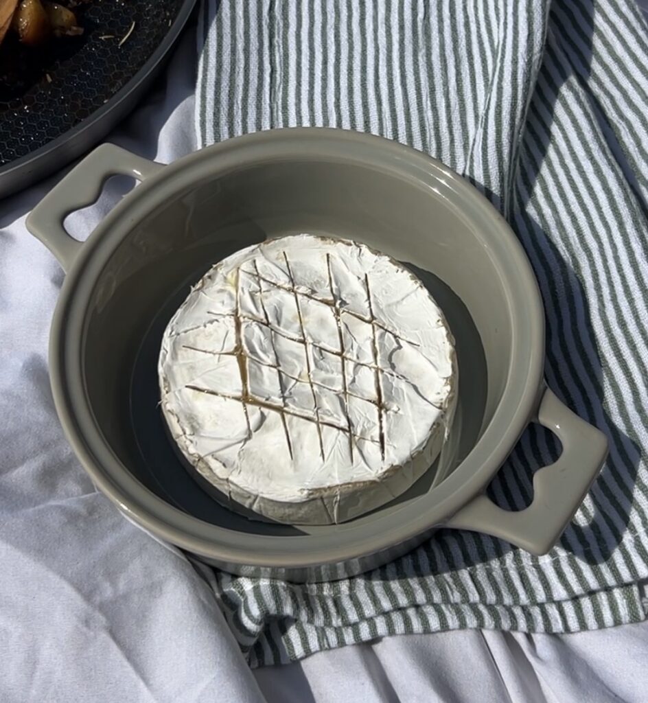 Warm Brie wheel with a soft center after baking