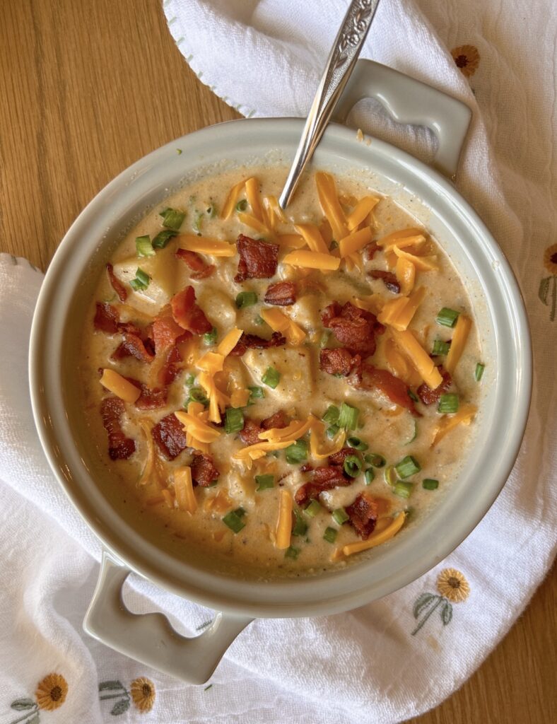 Creamy loaded baked potato soup with crispy bacon and baked potato toppings