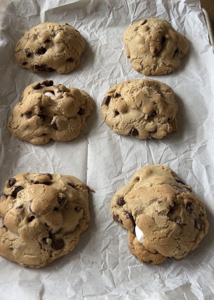 Freshly baked s’mores cookies with golden edges and soft centers