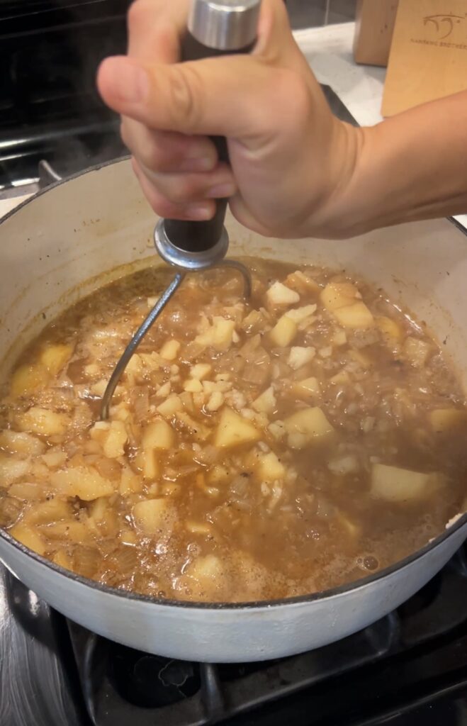 Partially mashing russet potatoes to naturally thicken potato soup