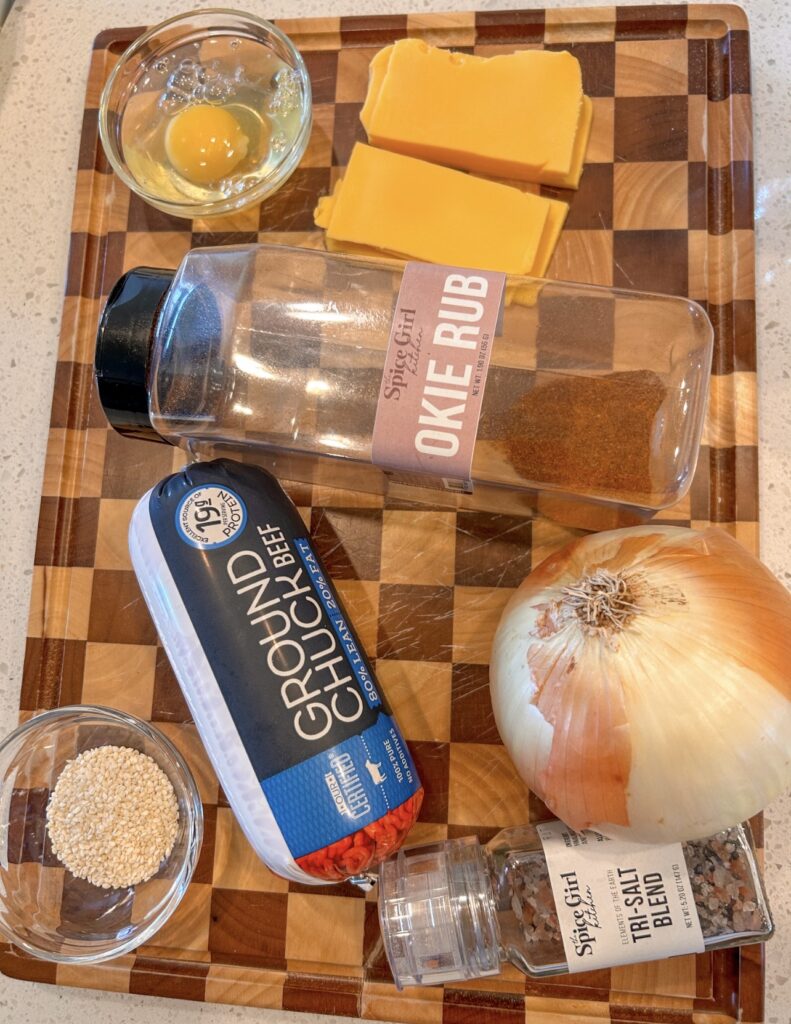 Ingredients for cheeseburger bombs with ground beef, Okie Rub, cheese, onion and pickles