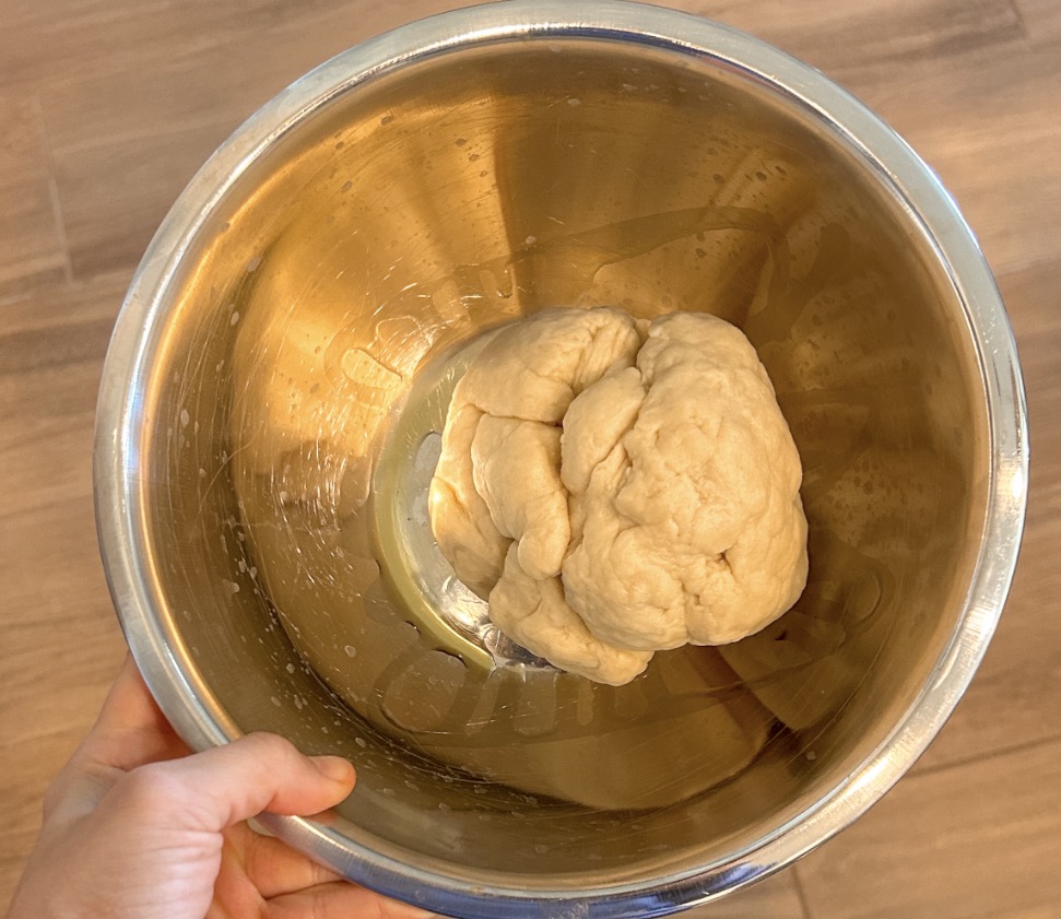 Soft homemade dough for cheeseburger bombs mixing in a stand mixer
