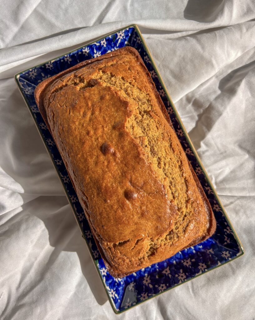 Freshly baked brown butter pumpkin bread with a golden brown top
