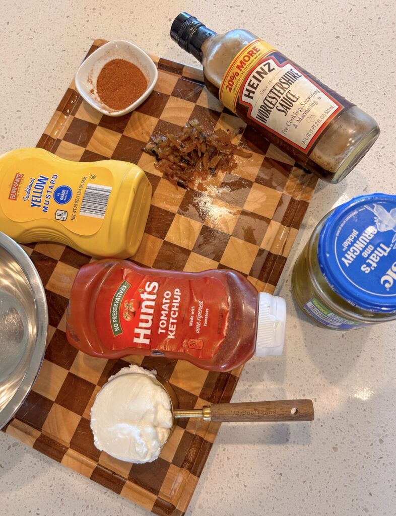 Ingredients for homemade burger sauce with mayonnaise, ketchup, mustard and pickle juice